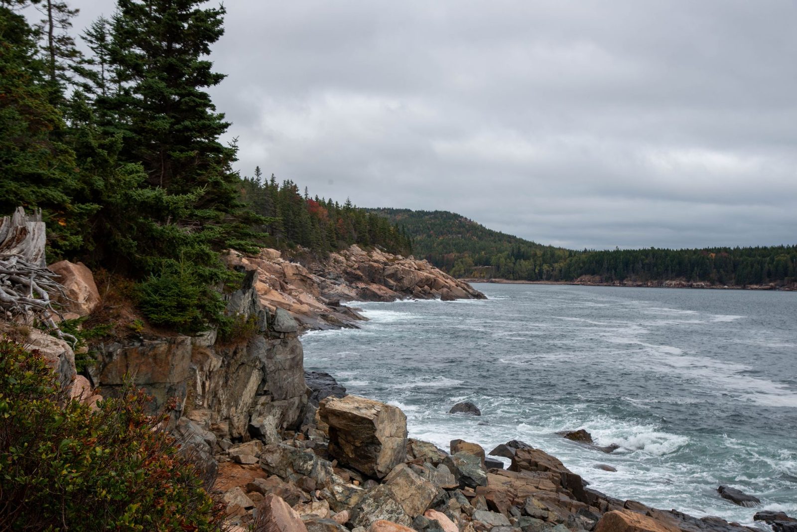 Stunning view of the rocky coastline in Acadia National Park, Maine, during fall